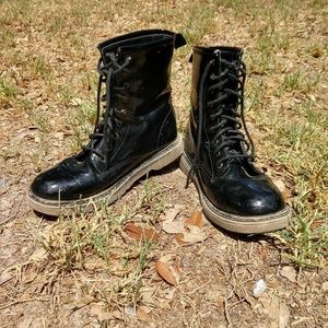 Black glossy combat boots